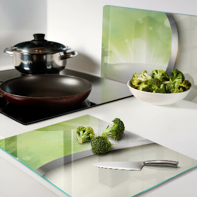 Tabla de cocina Bokeh verde con rayos de luz