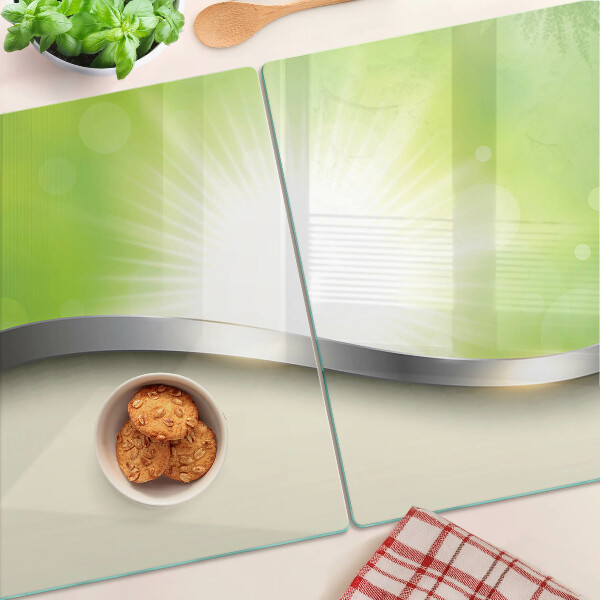 Tabla de cocina Bokeh verde con rayos de luz