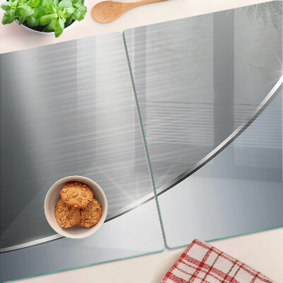 Tabla de cortar de cristal Brillo metálico con reflejos.