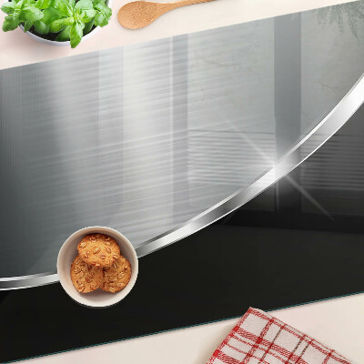 Tabla de cortar de cristal Brillo metálico con reflejos.