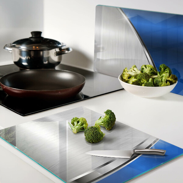 Tabla de cortar Patrón metálico con acentos azules.