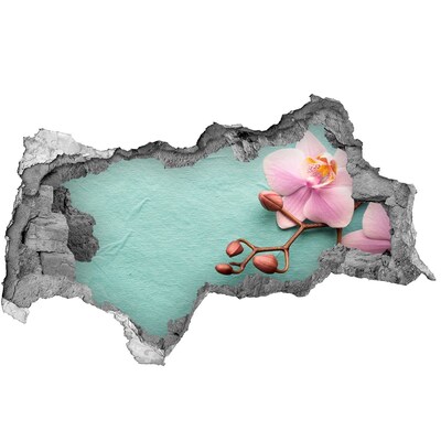 Samoprzylepna naklejka fototapeta Kwiat orchidei w uszkodzonej ścianie
