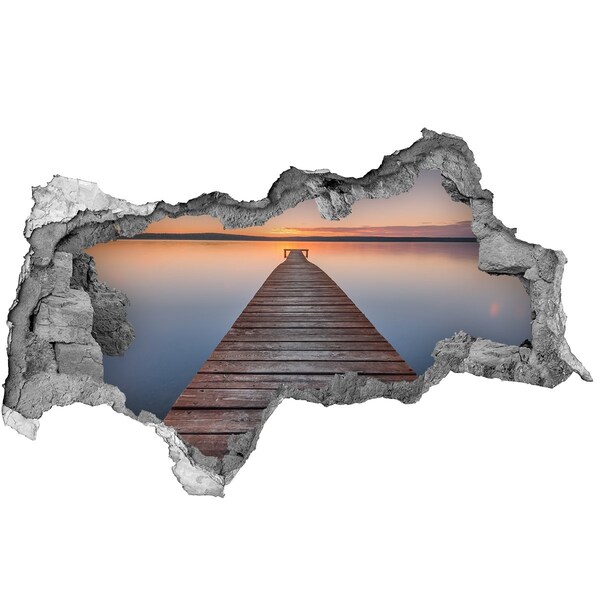 Vinilo adhesivo boquete en la pared rota Puesta de sol sobre el lago