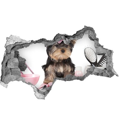 Fotomural autoadhesivo efecto agujero 3d Un dulce Yorkshire Terrier con un lazo rosa.