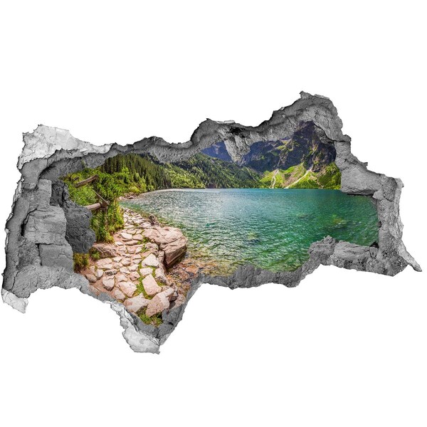 Fotomural autoadhesivo efecto agujero 3d Un lago de montaña en el valle.