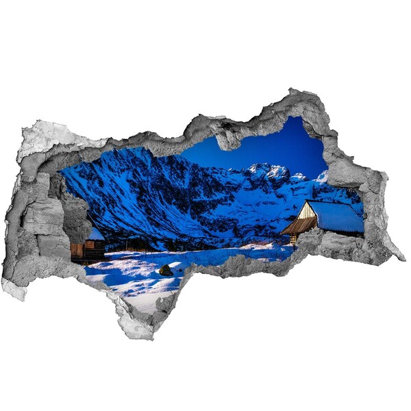 Dziura 3d w ścianie naklejka Zimowa chatka w górach