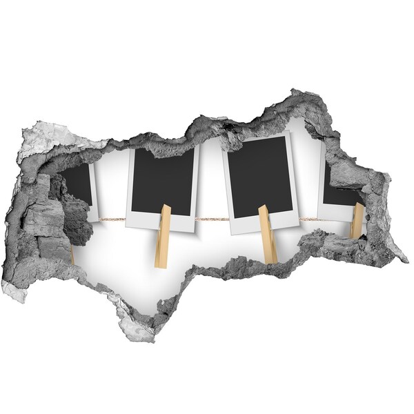 Vinilo efecto 3d pared rota irregular Una pared dañada con marcos de fotos.