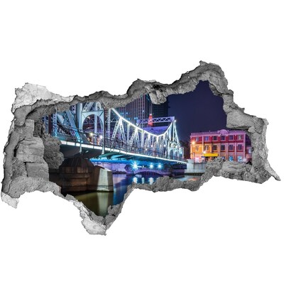 Vinilo adhesivo boquete en la pared rota El puente iluminado por la noche