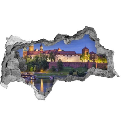 Fotomural autoadhesivo efecto agujero 3d Un castillo junto al río en el paisaje nocturno.