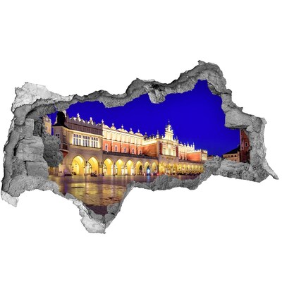 Fotomural autoadhesivo efecto agujero 3d La Plaza del Mercado Principal de Cracovia por la noche