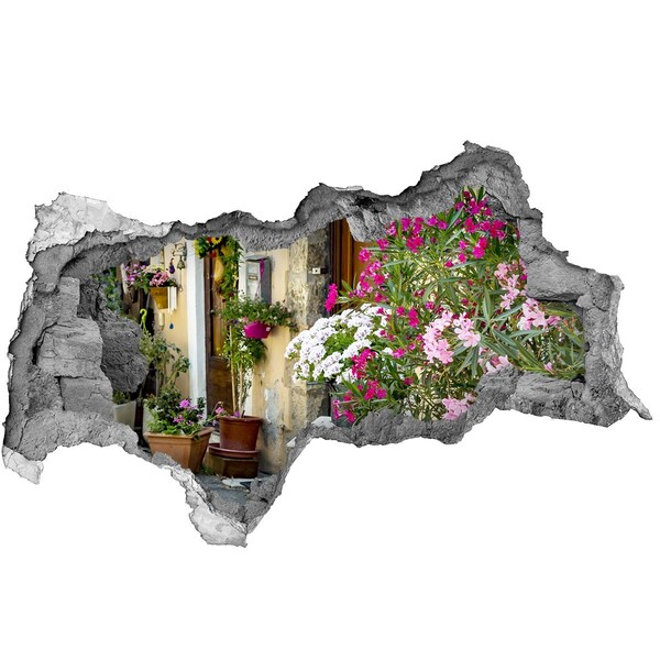 Vinilo efecto 3d pared rota irregular Un rincón de flores en el pueblo