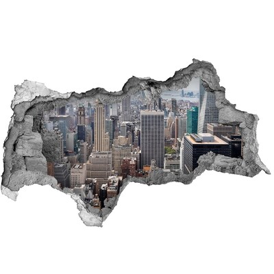 Vinilo efecto 3d pared rota irregular Vista de la ciudad desde un agujero en la pared.