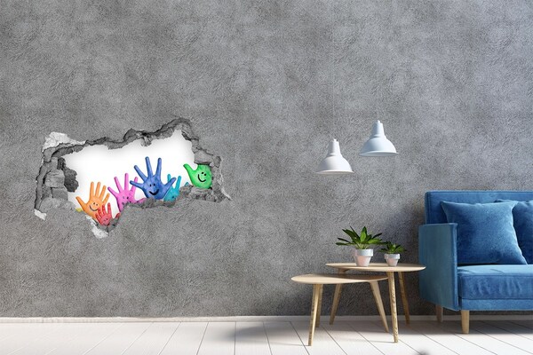 Pegatina decorativa agujero en la pared 3d Manos alegres sobre el fondo de hormigón.