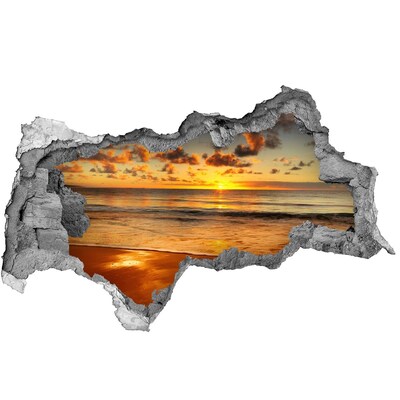 Vinilo adhesivo boquete en la pared rota Puesta de sol sobre el océano