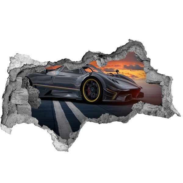 Vinilo adhesivo boquete en la pared rota Un coche de carreras en la pista.