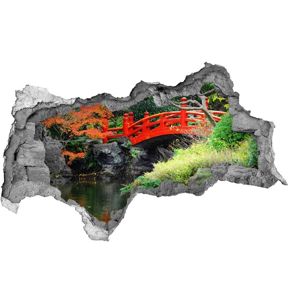 Vinilo adhesivo boquete en la pared rota Puente japonés en el jardín.