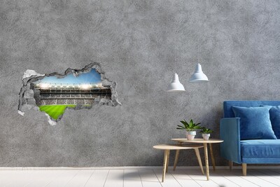 Vinilo adhesivo boquete en la pared rota El estadio de fútbol en acción