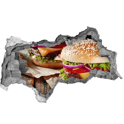 Naklejka 3D dziura okleina beton Soczysty burger w dziurze w ścianie
