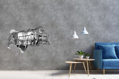 Vinilo efecto 3d pared rota irregular Una bicicleta en el muelle de la ciudad.