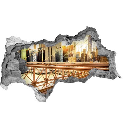 Vinilo adhesivo boquete en la pared rota Puente de Brooklyn al atardecer