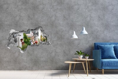 Fotomural autoadhesivo efecto agujero 3d Una calle encantadora en un pueblo blanco.