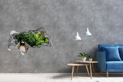 Vinilo efecto 3d pared rota irregular Un paraíso verde con un puente de madera.