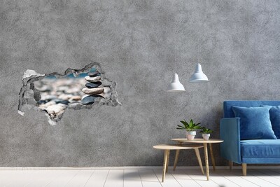 Fotomural autoadhesivo efecto agujero 3d Piedras en la playa