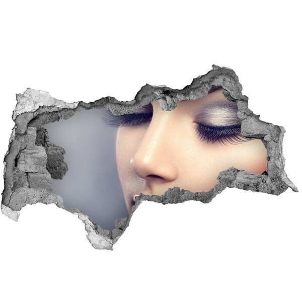 Vinilo adhesivo boquete en la pared rota Un rostro sensual en una pared rota.