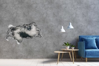 Fotomural autoadhesivo efecto agujero 3d Valle verde entre las nubes