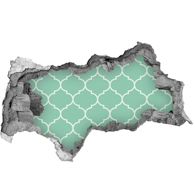 Vinilo adhesivo boquete en la pared rota Mosaico verde sobre el fondo de una pared dañada.