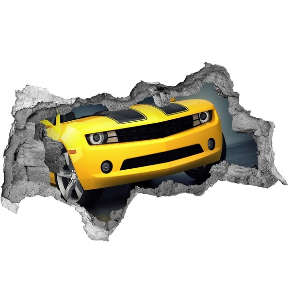 Vinilo adhesivo boquete en la pared rota Una pared en ruinas con un coche amarillo.