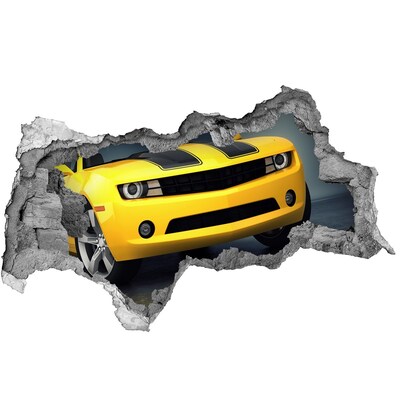 Vinilo adhesivo boquete en la pared rota Una pared en ruinas con un coche amarillo.