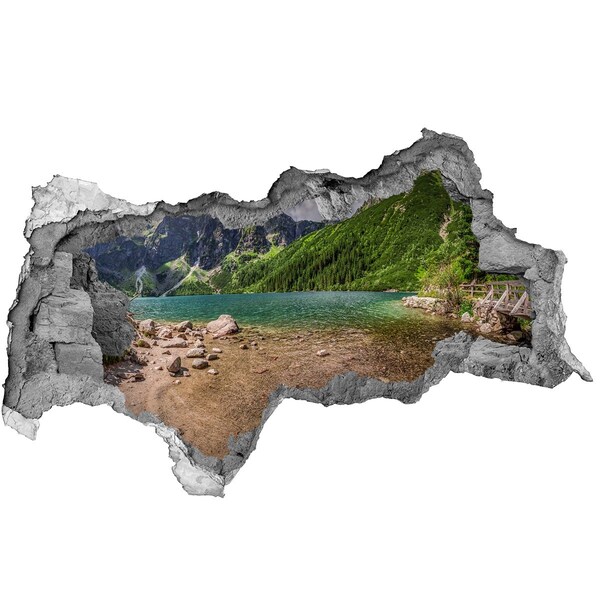 Fotomural autoadhesivo efecto agujero 3d Un lago de montaña en el valle.