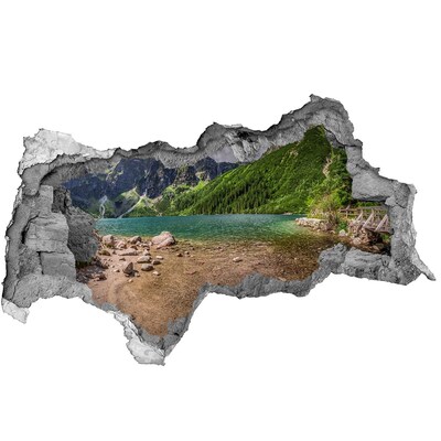 Fotomural autoadhesivo efecto agujero 3d Un lago de montaña en el valle.