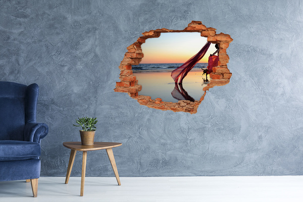 Fototapeta dziura na ścianę Taniec na plaży o zachodzie słońca