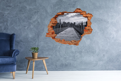 Naklejka 3D dziura na ścianę beton Widok na miasto z molo