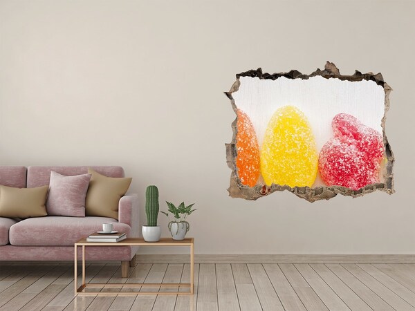 Vinilo pared rota 3d efecto realista Gomitas dulces en un agujero en la pared