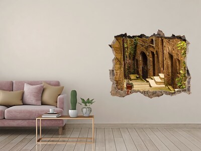 Pegatina agujero en la pared autoadhesiva Una calle encantadora en el pueblo