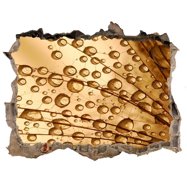 Pegatina de vinilo agujero 3d para pared Una gota dorada sobre un fondo de hormigón