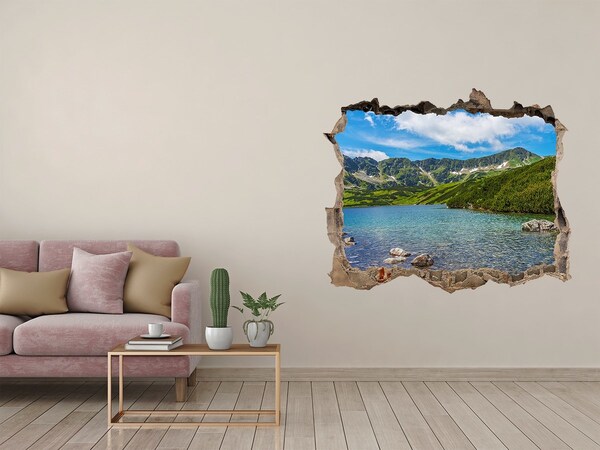 Vinilo pared rota 3d efecto realista Un lago de montaña rodeado de vegetación
