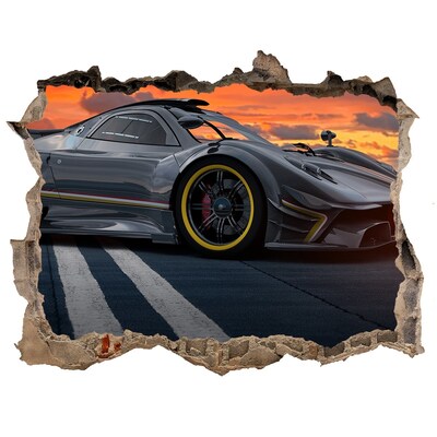 Pegatina agujero en la pared autoadhesiva Un coche de carreras en la pista