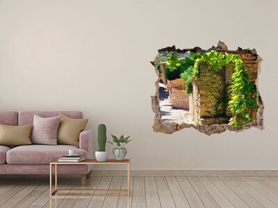 Pegatina agujero en la pared autoadhesiva Una calle verde en la ciudad