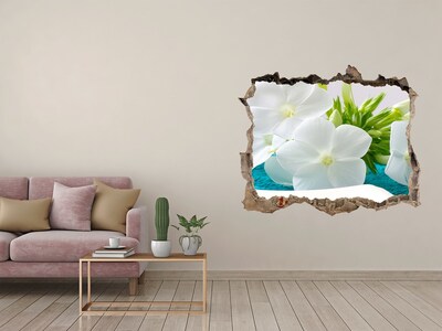 Vinilo pared rota 3d efecto realista Un paraíso de flores detrás del muro