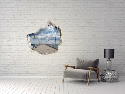 Vinilo decorativo boquete pared irregular Muelle junto al mar