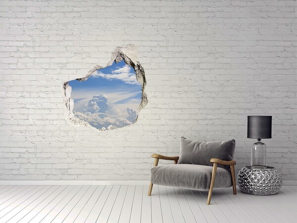 Vinilo decorativo boquete pared irregular El cielo está lleno de nubes.