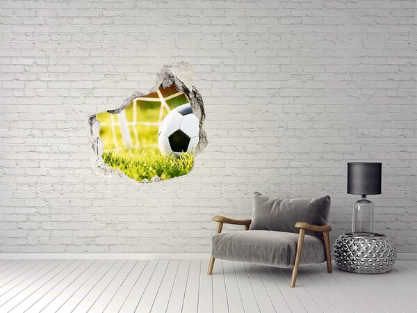 Vinilo decorativo boquete pared irregular Un gol en el campo