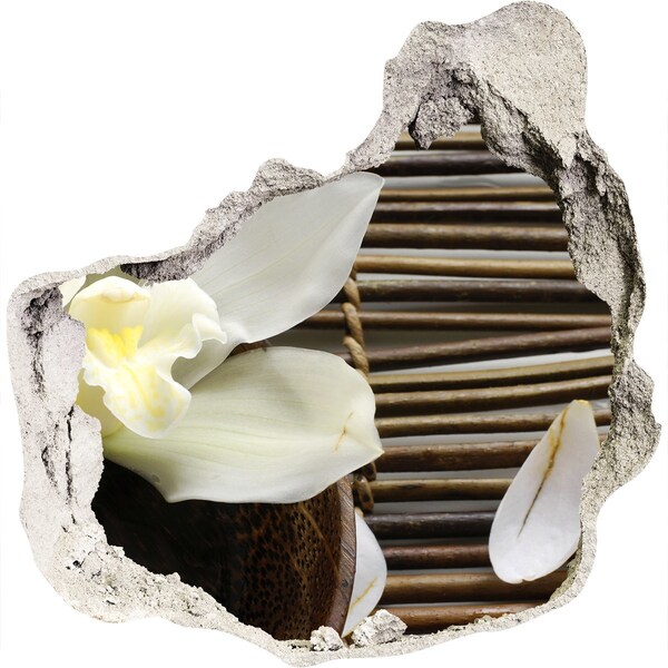 Vinilo adhesivo efecto agujero 3d para casa Un oasis floral entre las piedras.