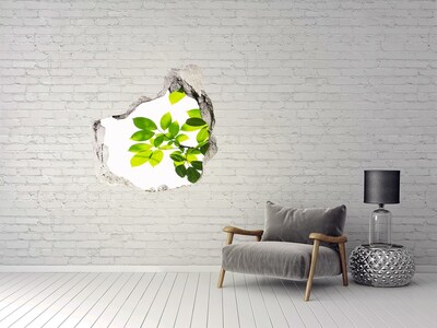 Vinilo decorativo boquete pared irregular Un oasis verde detrás del muro