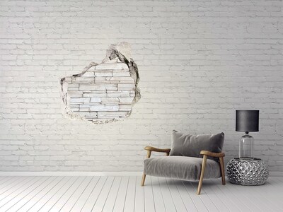 Vinilo decorativo boquete pared irregular Una pared dañada con acabado de piedra.