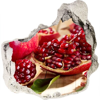 Naklejka 3D dziura na ścianę Owoc granatu w dziurze w ścianie